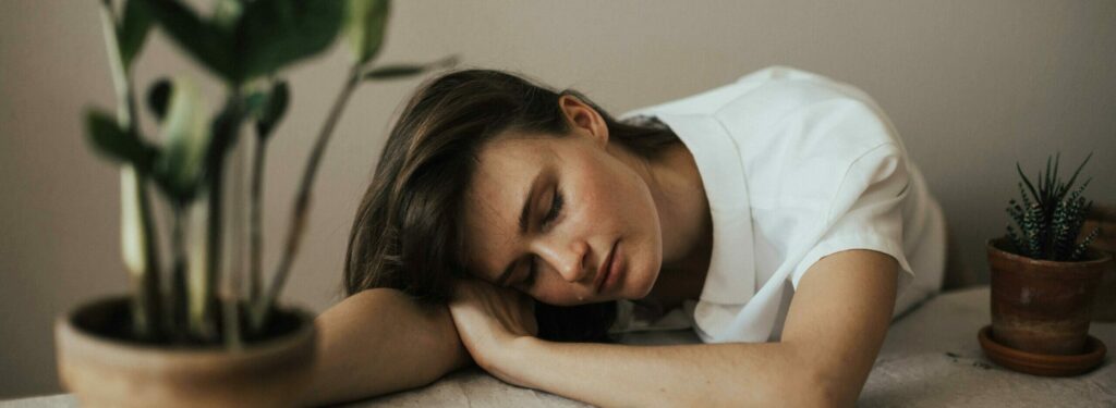 woman resting her head representing steroid withdrawal